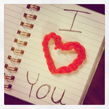 Notebook with I love you written in it.