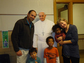 Pope Francis with a family.