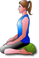 Kneeling meditation with a zafu cushion